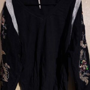 Free People great black sweater with unique sequenced balloon sleeves